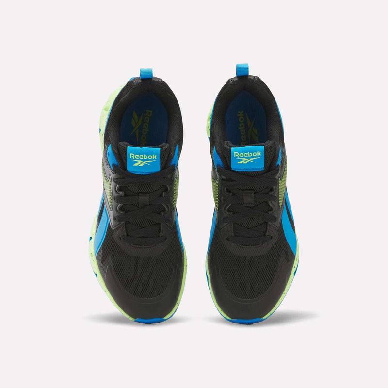 A pair of Reebok Pyro Storm 1V Shoes - Little Kids in black with blue accents and neon green soles, designed as kids’ athletic shoes, shown from above on a white background. These sneakers feature a durable rubber outsole for long-lasting wear and dependable traction.