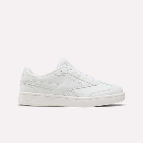 The Reebok Forte Pitch Shoes for little kids are shown in white, featuring a low-top, court-inspired design with white laces and understated stitched details, set against a simple light background.