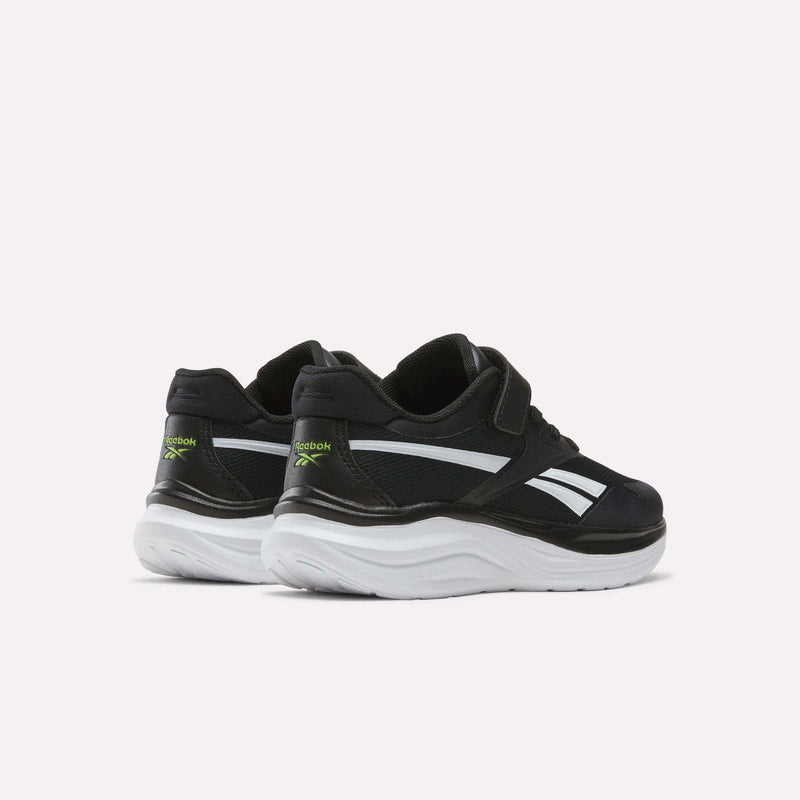 Black Reebok Blitzr Run Running Shoes - Big Kids with white midsoles, side stripes, and neon green accents on the heels.