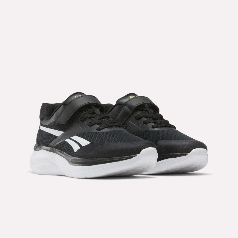 Black Blitzr Run Running Shoes - Big Kids by Reebok with white side logos, thick white soles, and hook-and-loop straps.
