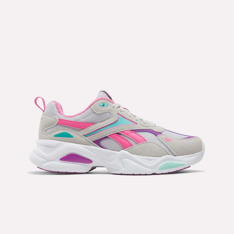 Reebok Charge Shoes - Big Kids with a thick white sole, grey overlays, and bright pink and teal accents.