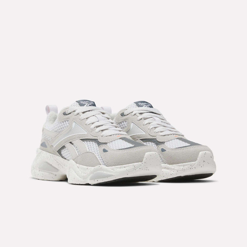 Off-white Reebok Charge Shoes - Big Kids athletic sneakers with mesh and suede overlays, featuring thick, speckled midsoles and laces.