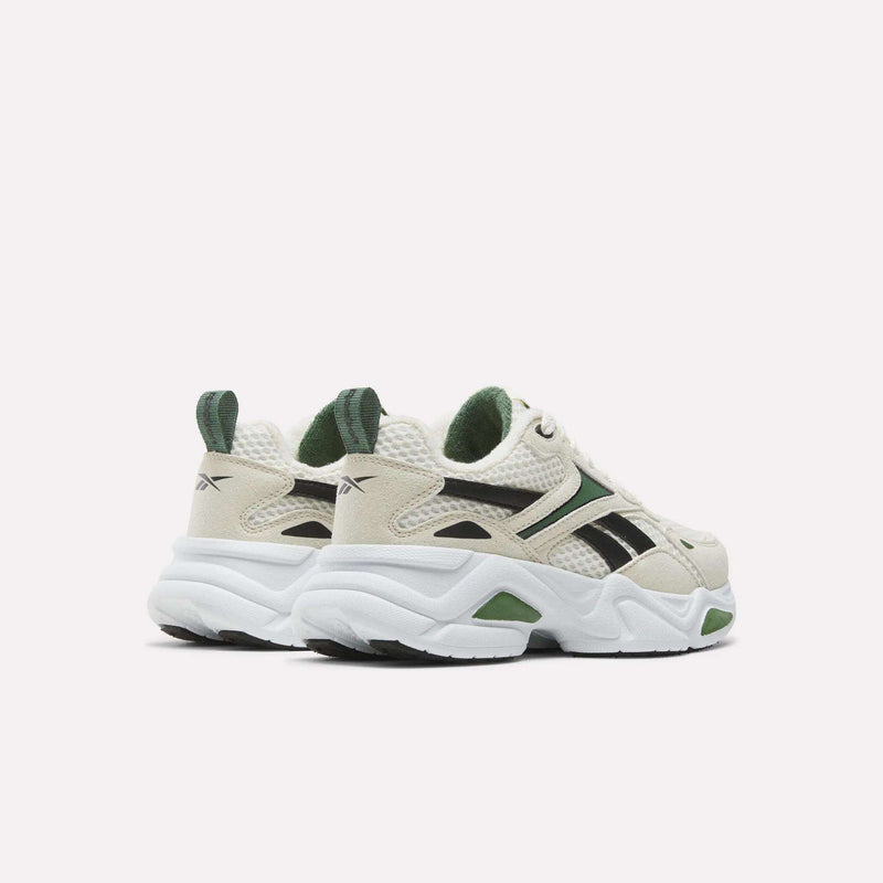 Rear view of off-white and green Reebok Charge Shoes - Little Kids with chunky white soles and black side logos.