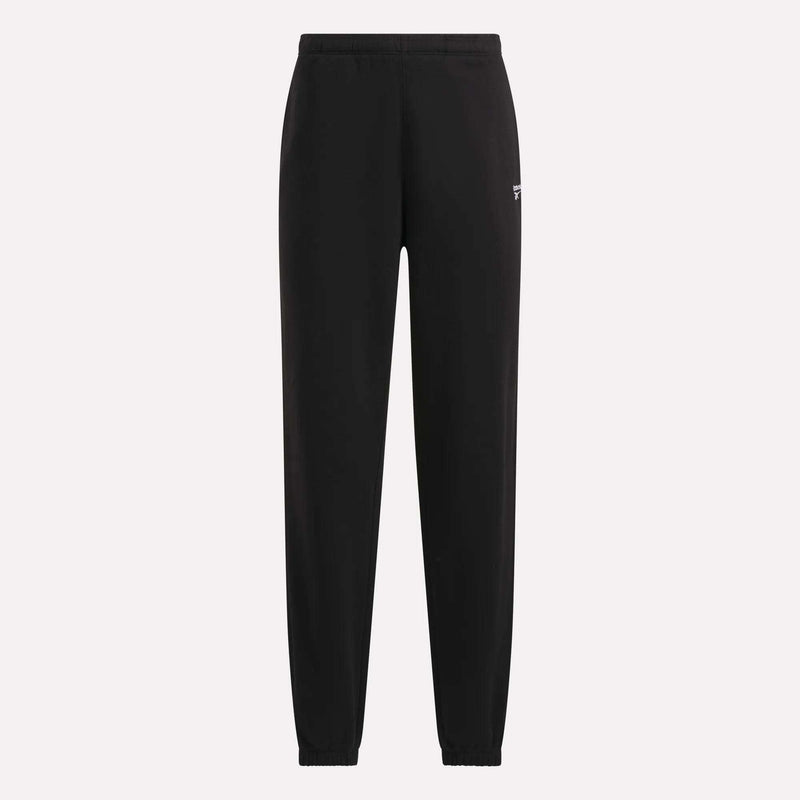 The Reebok Women’s Cinch Sweatpants are black athletic sweatpants featuring an elastic waistband and ankle cuffs, displayed on a plain light background. Designed with a modern look, these sweatpants showcase a small white Reebok logo on the upper left thigh.