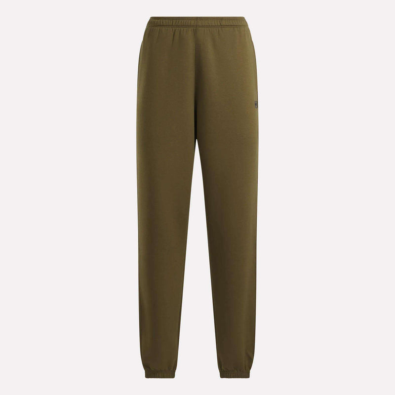 Reebok Women’s Cinched Joggers in olive green, featuring an elastic waistband and cuffs, are displayed against a plain white background. These soft joggers have a clean, versatile look with no visible patterns or logos on the front.