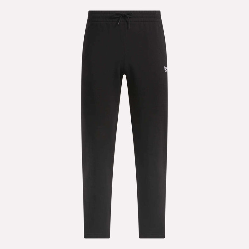 Men’s Open Hem Pants by Reebok, featuring a black design with a drawstring waist and a small white embroidered logo on the left thigh, are displayed on a plain white background—these relaxed pants offer classic comfort perfect for everyday wear.