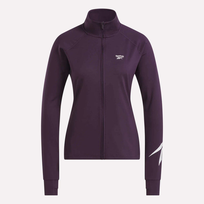 Front view of the Women’s Motion Core Full-Zip by Reebok in purple, showcasing a white Reebok logo on the chest and a bold white graphic on the lower left sleeve, set against a plain white background.