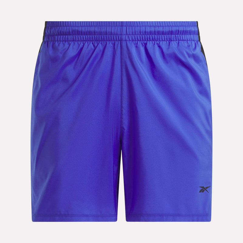 Men’s Running Shorts 7″ by Reebok in a vibrant blue color, featuring a 7-inch inseam, an elastic waistband, and a small black Reebok logo on the left leg, displayed against a white background.