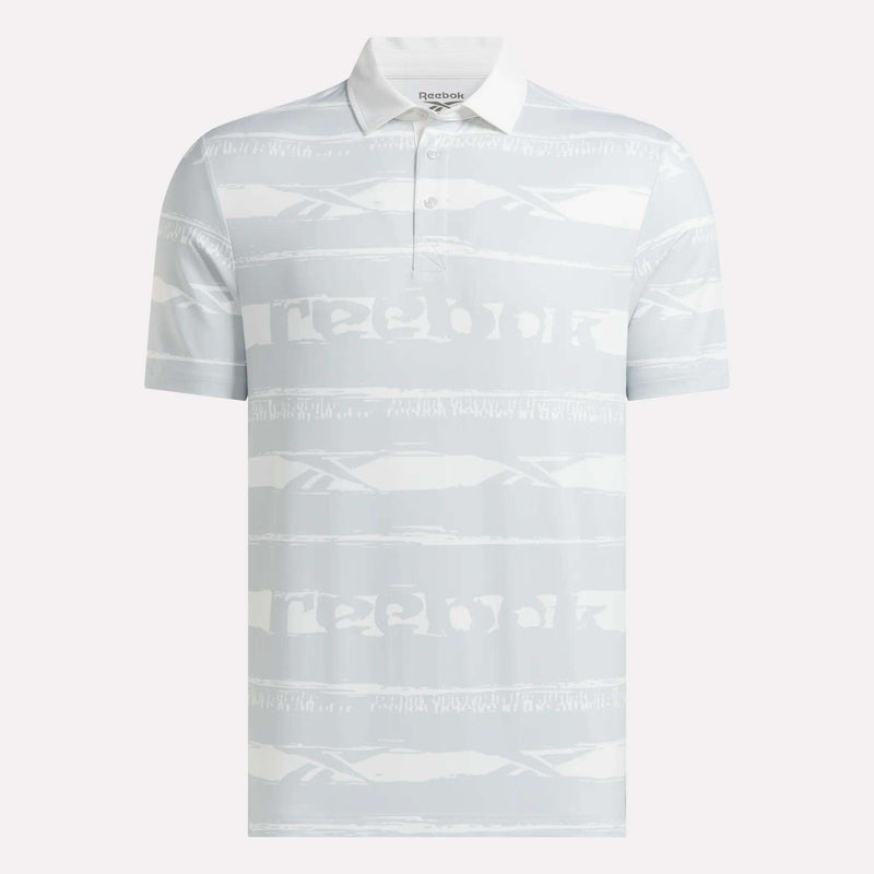 A Men's Tournament Polo Shirt by Reebok, featuring light gray abstract horizontal stripes on a white fabric and a buttoned collar, is displayed on a plain background.