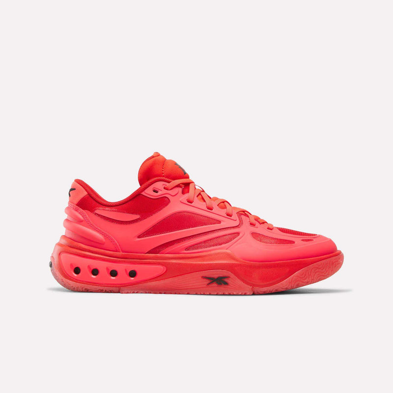 Red Reebok Engine A basketball shoes with a thick midsole featuring black circular ERS technology accents.