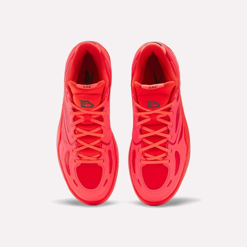 Pair of bright red Engine A Basketball Shoes by Reebok viewed from directly above.