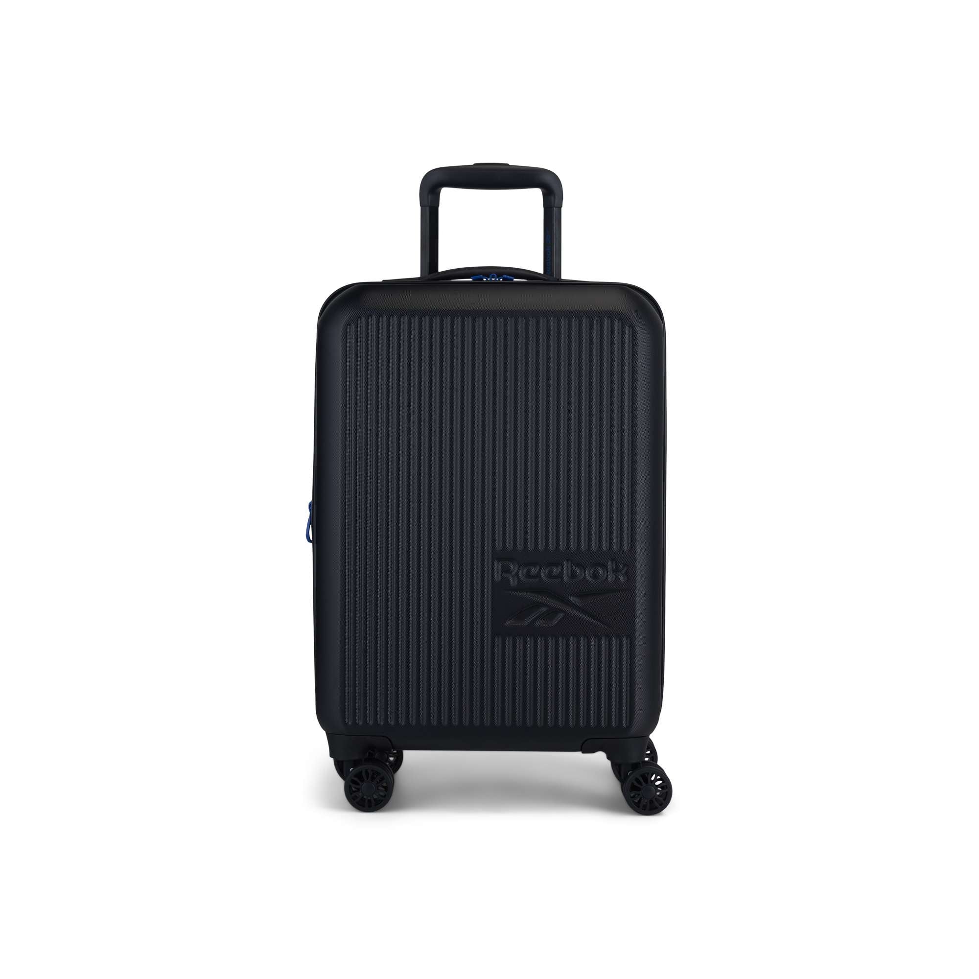 The Reebok Action Duo 2 Piece Luggage Set features a black lightweight suitcase with vertical grooves, four spinner wheels, a telescoping handle, and an embossed logo, shown against a white background.
