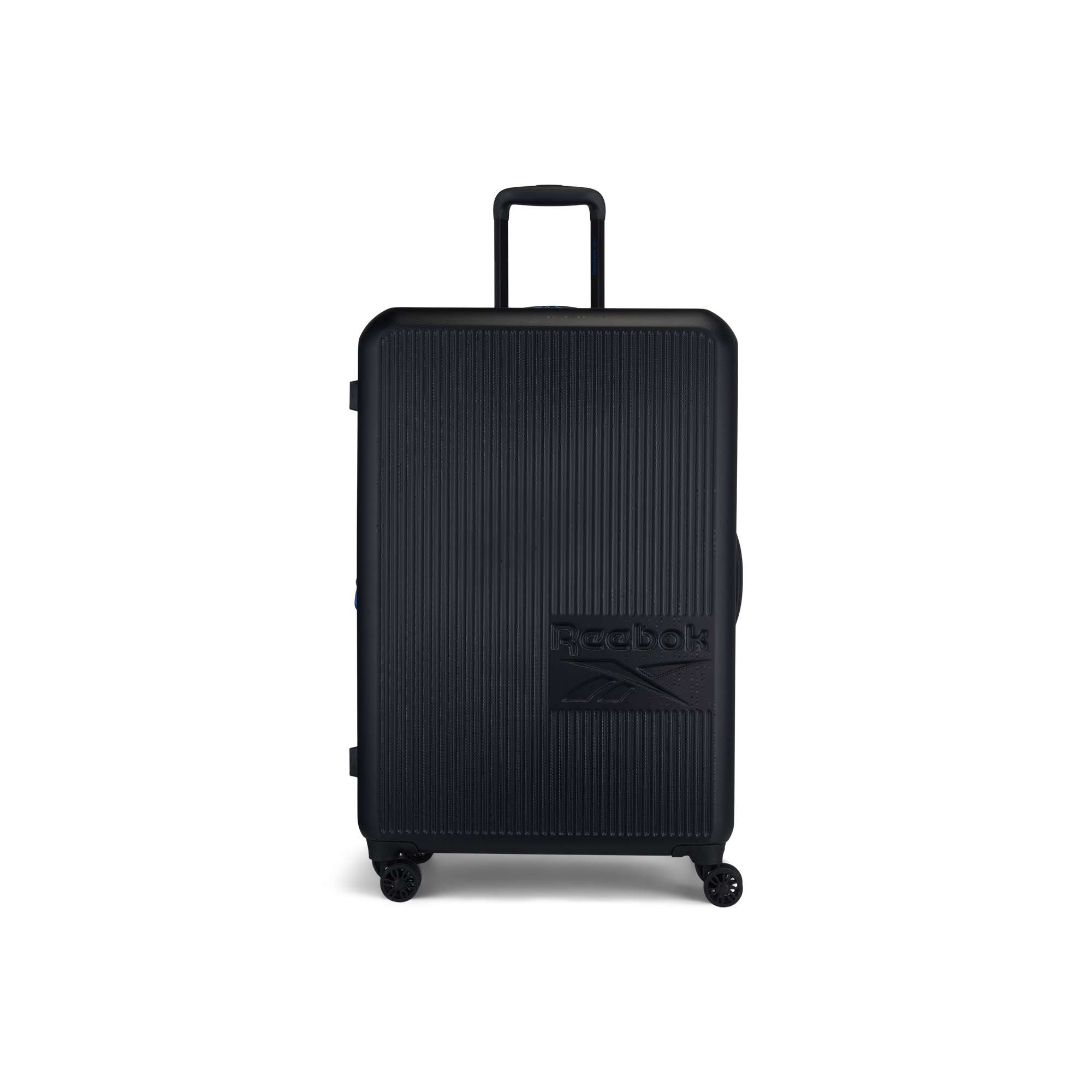 The Reebok Action Duo 2 Piece Luggage Set features a large black hard-shell suitcase with vertical ridges, four spinner wheels, a telescopic handle, and a raised front logo, shown upright against a white background.