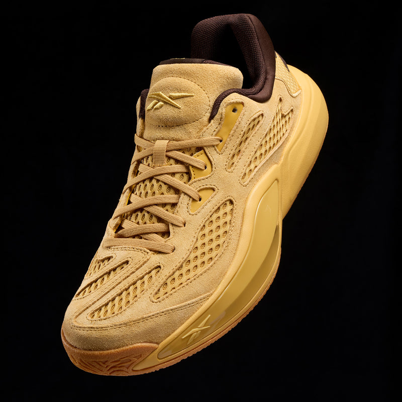 Tan Reebok Engine A 26 basketball shoes with an engineered mesh upper, suede overlays, and a thick, chunky sole.