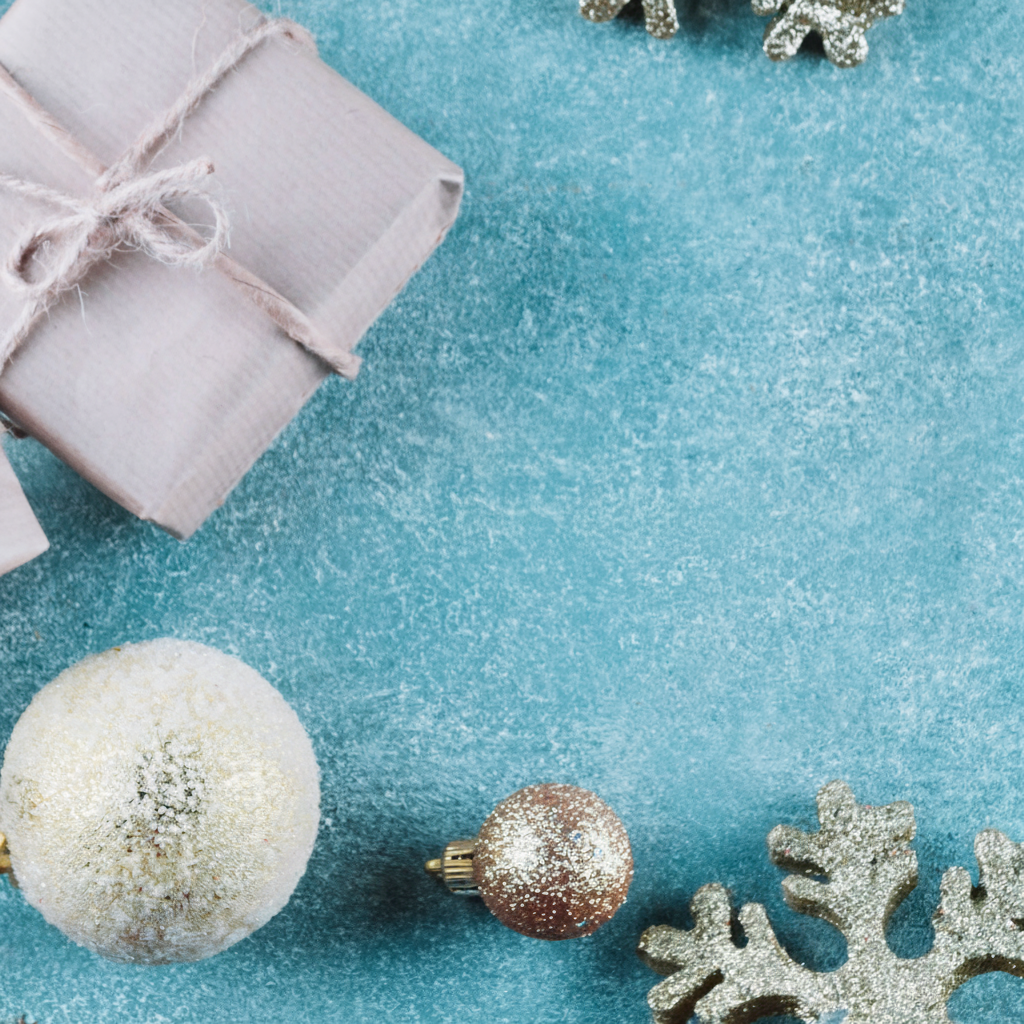 presents and snowflakes on light blue background