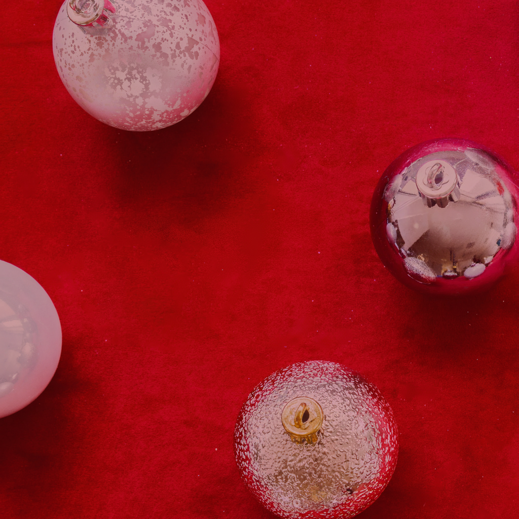 silver ornaments on red background