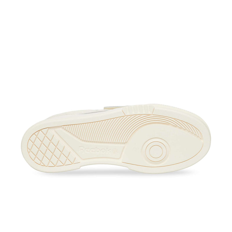 Off-white Reebok Club C LTD sneaker outsole featuring a textured diamond pattern at the heel and a circular pivot point at the forefoot.