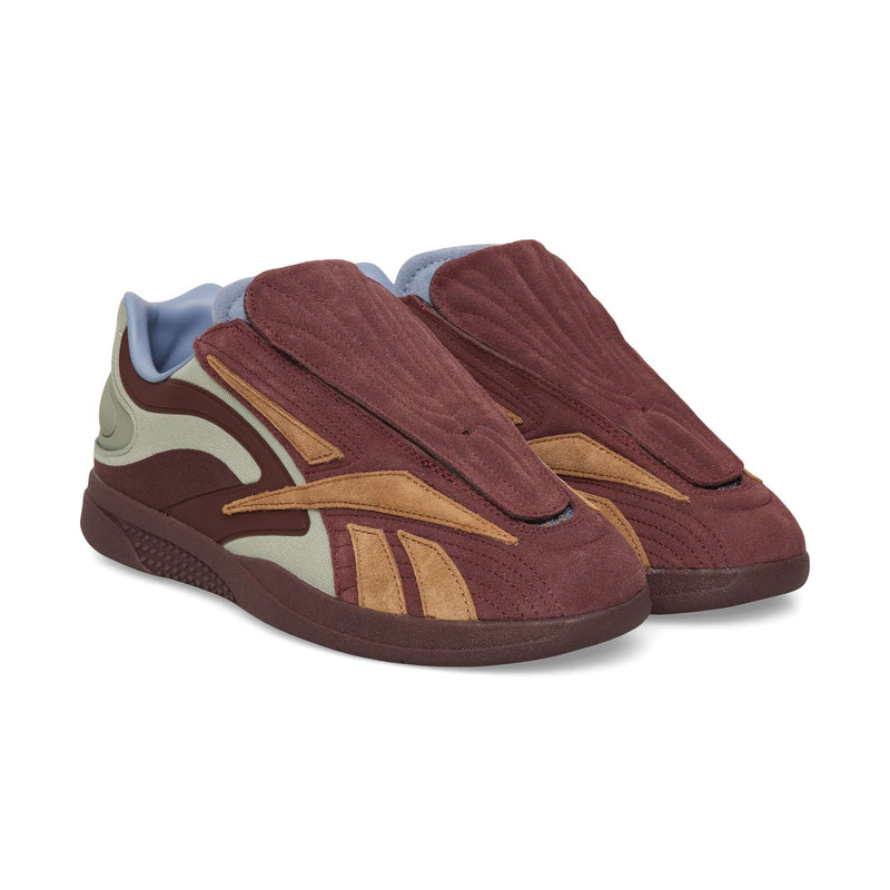 Maroon and tan Reebok Hammer Pro LTD sneakers featuring a wide, overlapping tongue and a thick, textured durable rubber sole.