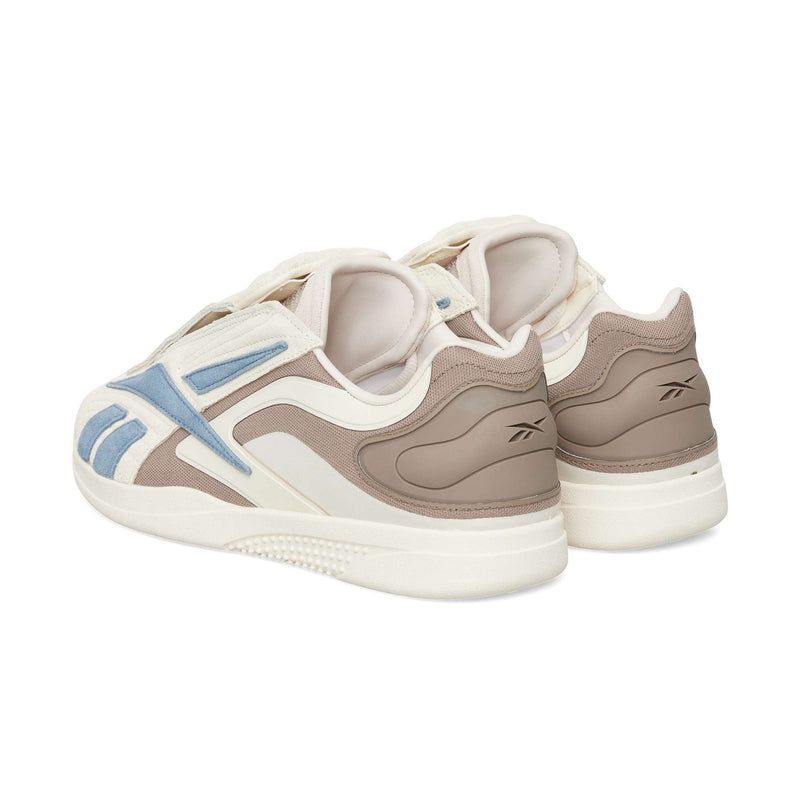 Low-top Reebok Hammer Pro LTD sneakers in shades of beige and cream with blue accent stripes and a textured rubber sole.