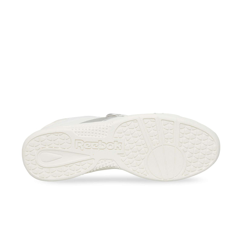 The durable rubber sole of the Reebok Hammer Pro LTD features a white textured finish with a circular pivot point and a repeating pattern.