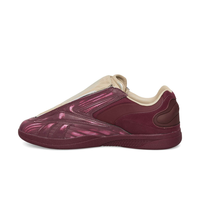 Maroon Reebok Hammer Pro LTD low-top sneakers with a glossy, textured leather upper, a beige tongue, and a durable rubber sole.