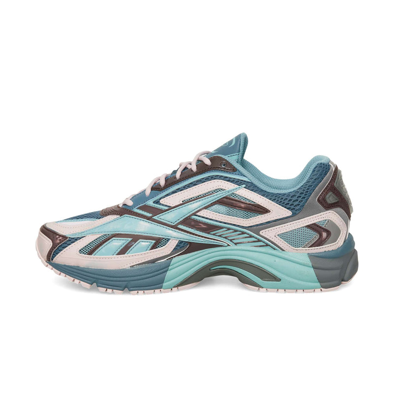 Reebok Premier Road Ultra low-top running shoe in shades of blue and gray with a chunky, dual-density midsole and mesh panels.