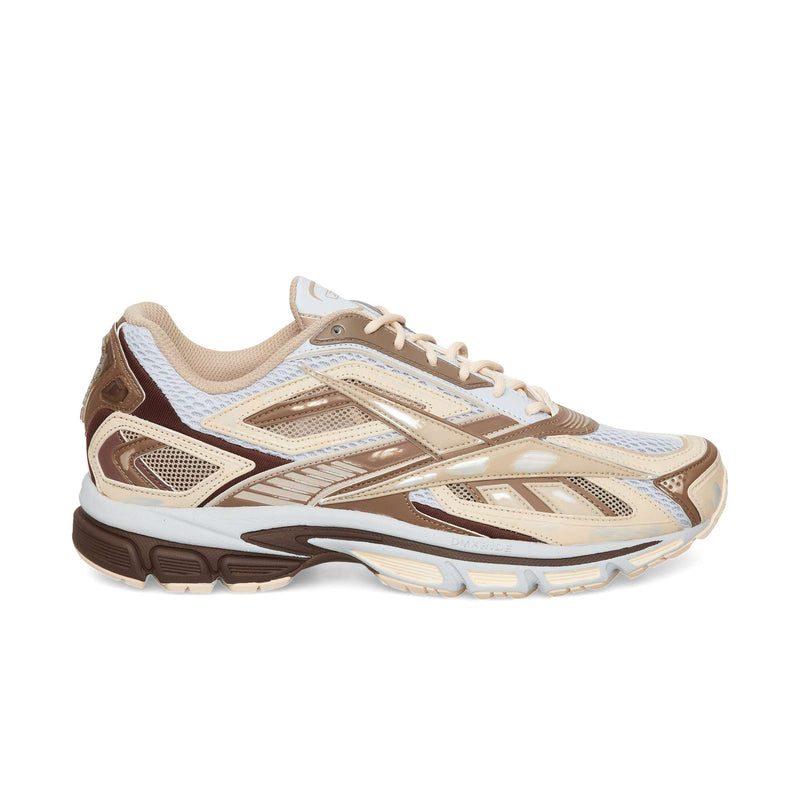 Reebok Premier Road Ultra low-top sneaker in grey, tranquil blue, and tapioca, featuring a mesh and layered synthetic upper with a dual-density midsole.
