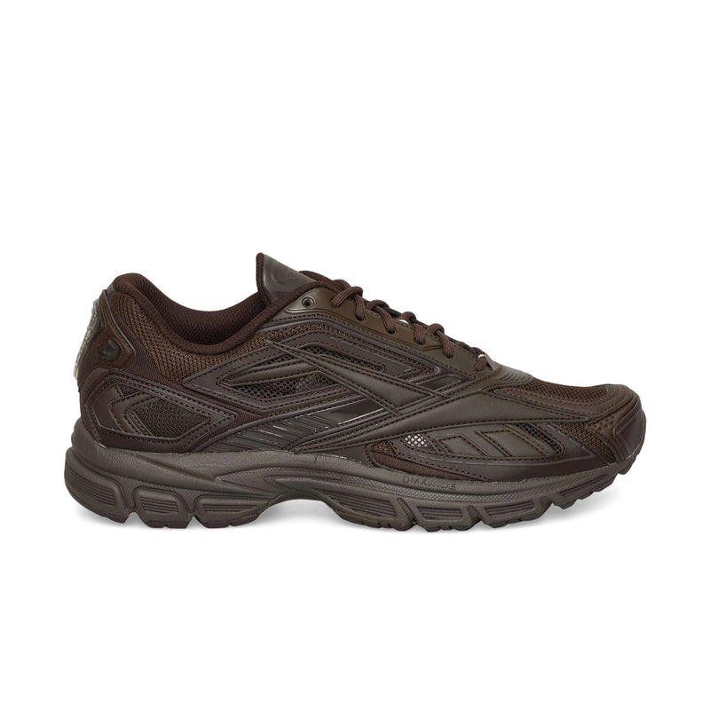 Espresso Reebok Premier Road Ultra athletic sneaker with mesh paneling and a dual-density midsole.