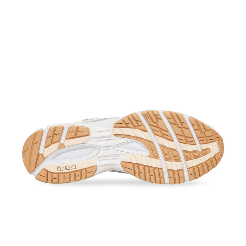 Bottom view of a Reebok Premier Road Ultra showing a white dual-density midsole and a tan rubber outsole with a textured tread pattern.
