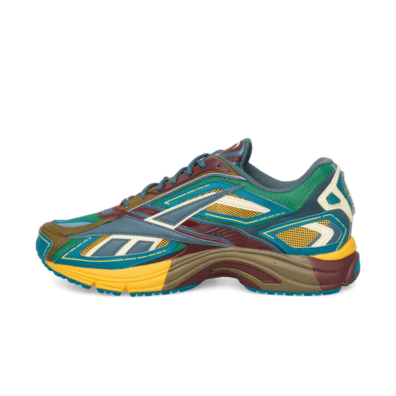 Reebok Premier Road Ultra low-top running sneaker with a multi-colored, layered design in blue, green, burgundy, and yellow.