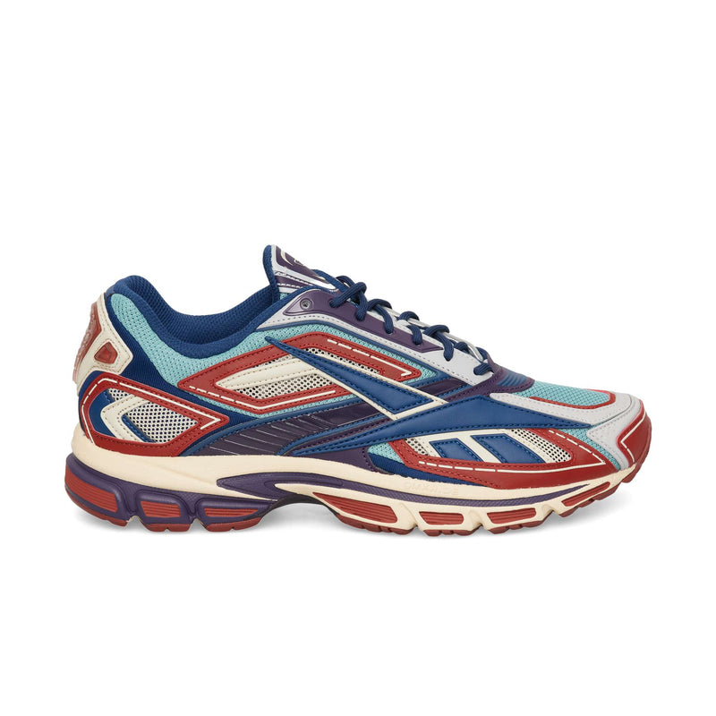 Reebok Premier Road Ultra running sneaker in Red/Hazy Teal/Paper White, featuring a multi-layered design with mesh panels and a thick, lugged dual-density midsole.