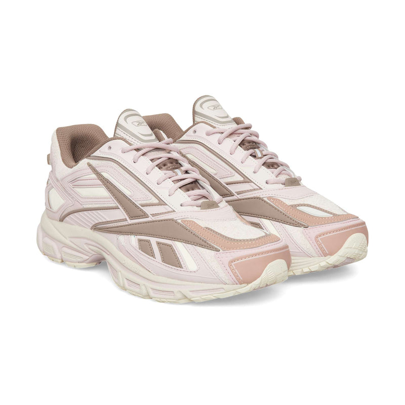 Light pink and mauve Reebok Premier Road Ultra sneakers with layered paneling and chunky, dual-density midsoles.