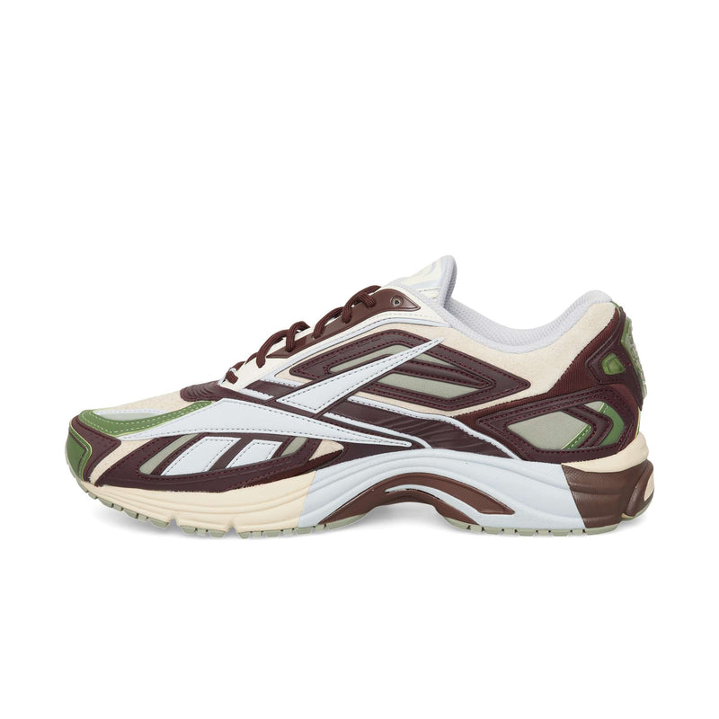 Reebok Premier Road Ultra low-top running shoe in cream, dark red, and olive green with a thick, sculpted dual-density midsole.