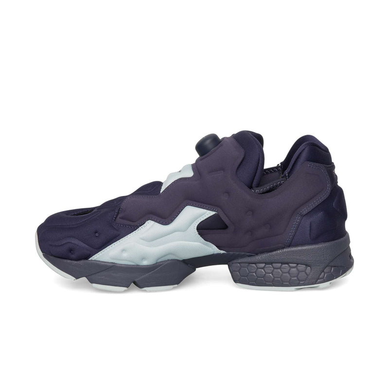 Dark blue Reebok Instapump Sliver slip-on sneaker with a chunky, segmented sole and an integrated air pump mechanism on the tongue for a custom fit.