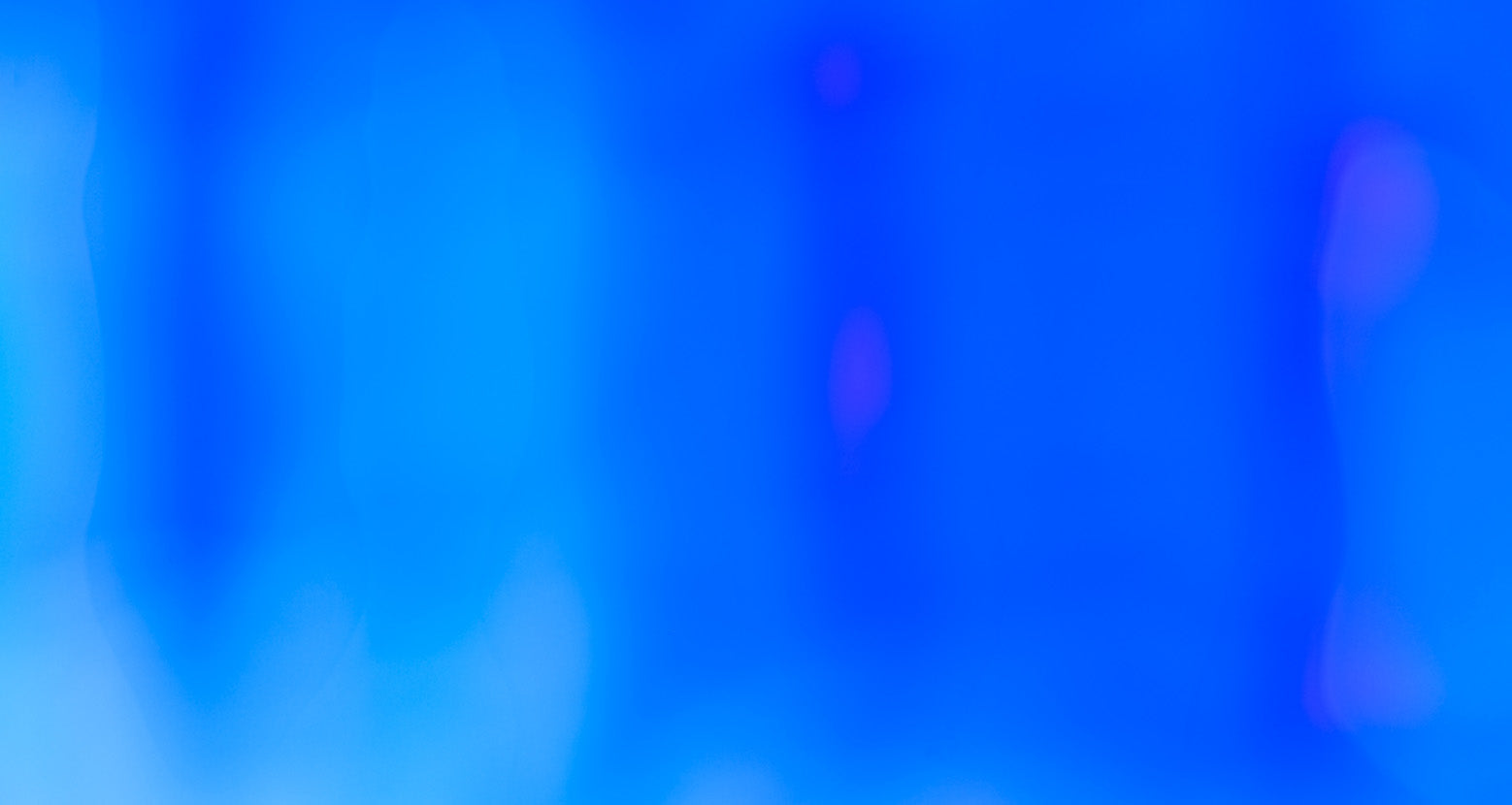 Abstract blue and purple gradient with blurred shapes