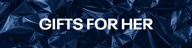 A dark blue crumpled foil background with large white text reading 'GIFTS FOR HER' across the center.