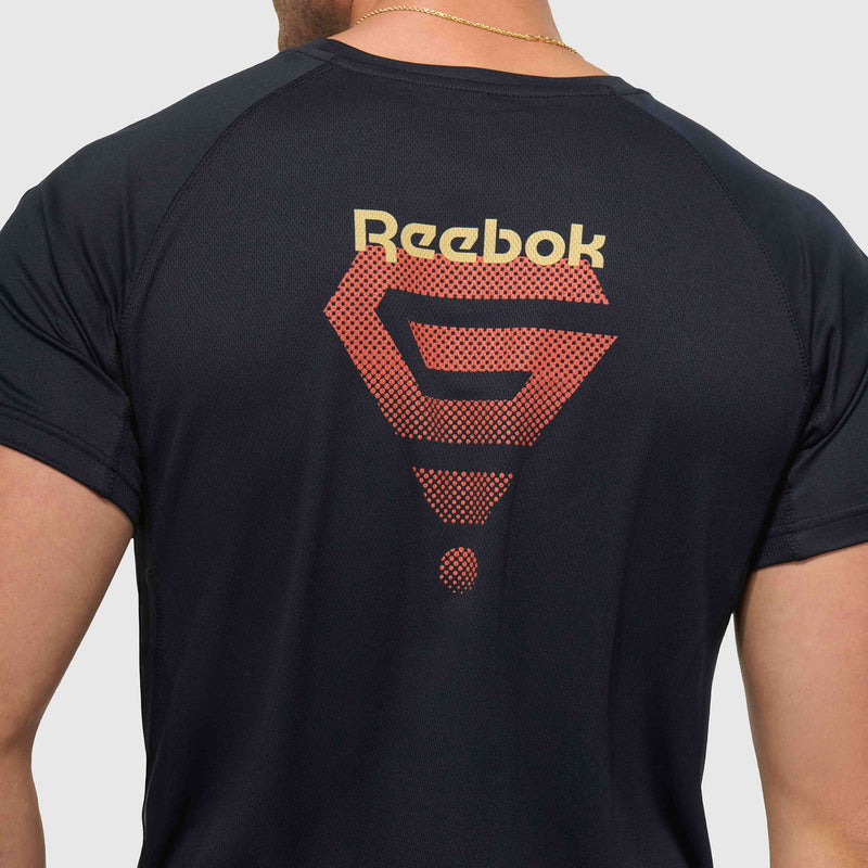 A person is shown from the back wearing the Reebok x GLDN PNT Tech Tee in black, featuring a red and gold geometric logo and "Reebok" printed on the upper back.