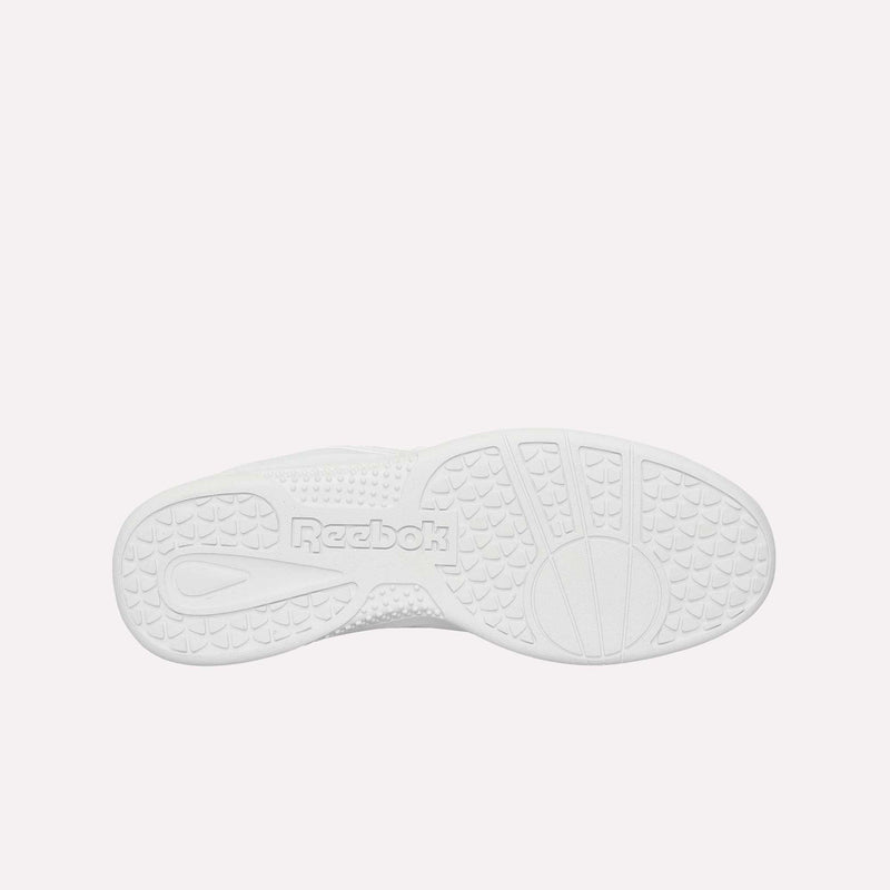 The image displays the white sole of the Reebok Hammer Pro LTD Shoes, viewed from underneath. The durable rubber outsole is designed with textured patterns for enhanced grip, and features the Reebok logo embossed at the center.