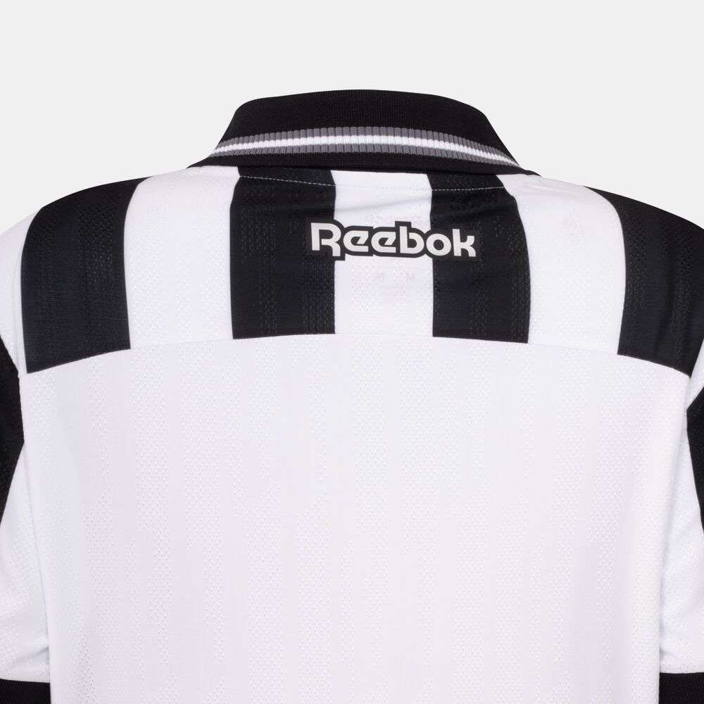 Back view of the Botafogo Women's Home Jersey by Reebok, showing black and white stripes, a black collar, and a white Reebok logo on the upper back.