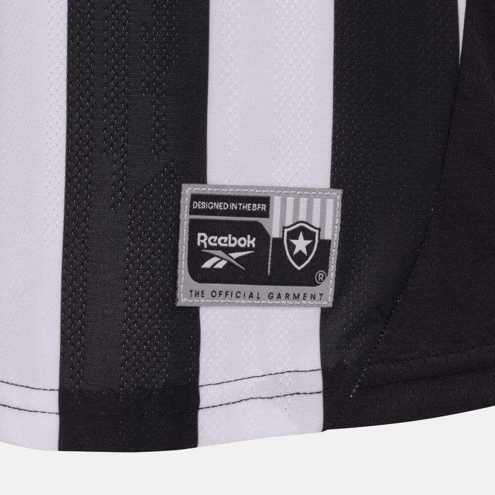 Close-up of the Botafogo Women's Home Jersey by Reebok for the 25/26 season, showing black and white stripes, club crest, and detailed stitching with visible fabric texture.