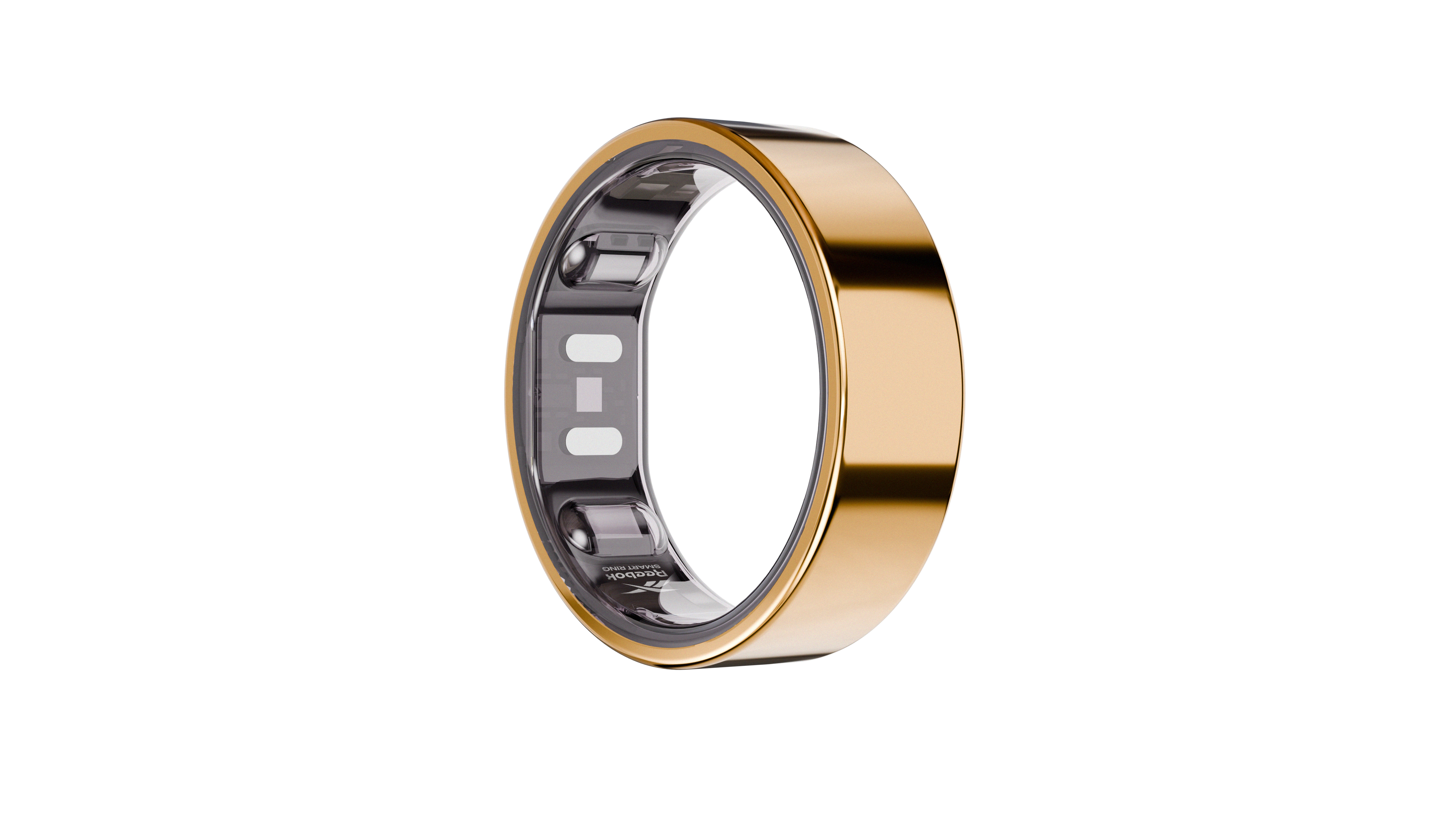 The Reebok Smart Ring by Reebok features a sleek gold finish and visible internal sensors, offering a stylish way to track your biometric data. Displayed on a plain white background, it combines advanced fitness tracking with elegant design.