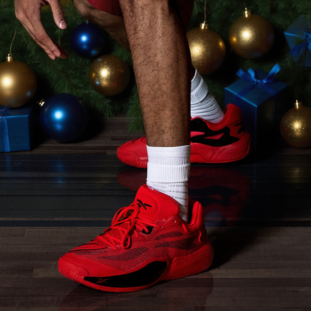 red gym sneakers on a wooden floor
