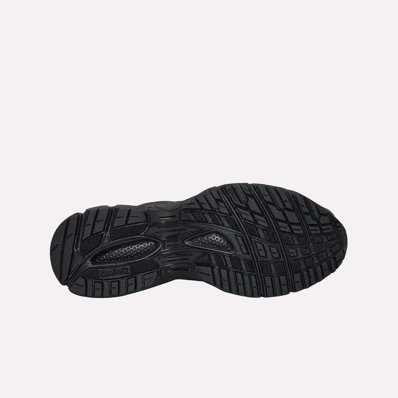 The Reebok Premier Road Ultra LTD Shoes feature a black sole with a textured tread pattern and prominent Reebok branding, highlighted by a dual-density midsole inspired by archival running sneaker design, displayed against a plain white background.
