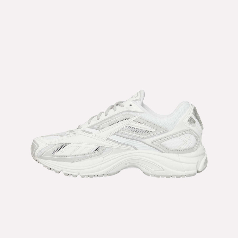 A pair of Reebok Premier Road Ultra LTD Shoes, featuring a white athletic running sneaker design with mesh and synthetic overlays, a chunky dual-density midsole, and a lace-up closure, is displayed on a plain light background. Inspired by the original Premier Road Ultra, these shoes blend performance with contemporary style.