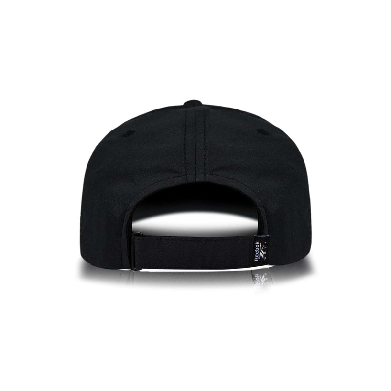 The Reebok Chip Pro is a black baseball cap seen from the back, featuring an adjustable strap and a small black-and-white tag. It’s shown against a plain white background.