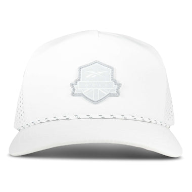 The Reebok Madison Ii is a white baseball cap with a light grey mesh back, adjustable snapback, and a light grey embroidered shield patch on the front. The cap is shown facing forward against a plain backdrop.