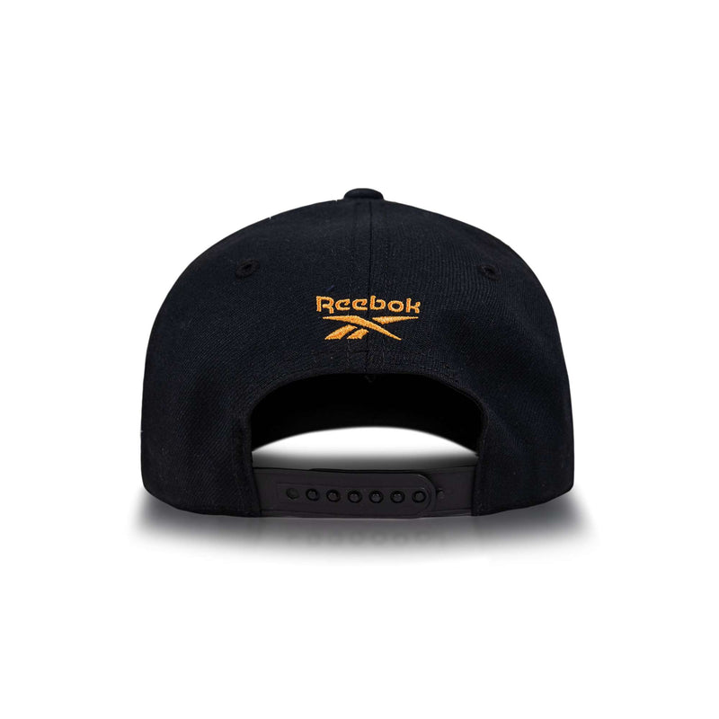 Reebok Vector Baseball Cap in black shown from the back, with an adjustable snap closure and yellow Reebok logo embroidery above the opening.