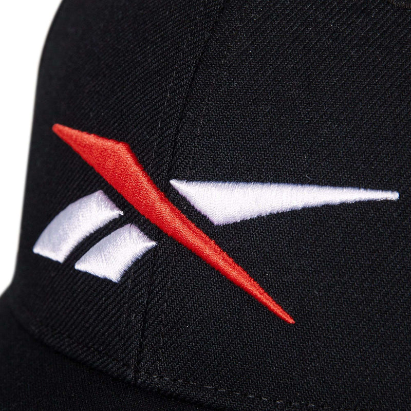 Close-up of the Vector Baseball Cap by Reebok, showcasing the red and white embroidered logo on the front.