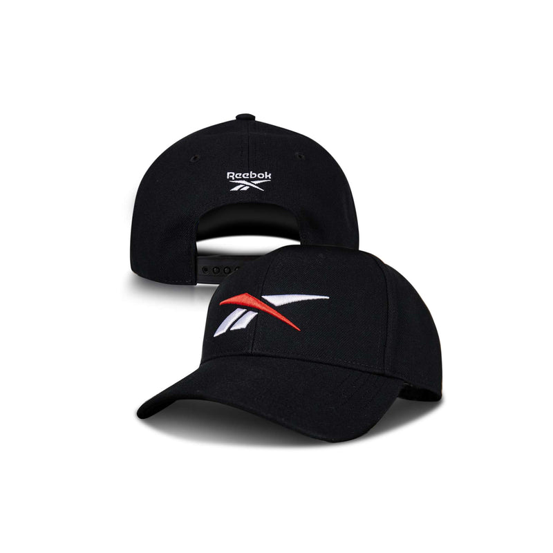 The Reebok Vector Baseball Cap, shown in black from both front and back, features a white and red Reebok logo on the front, Reebok text on the back, and an adjustable snap closure.