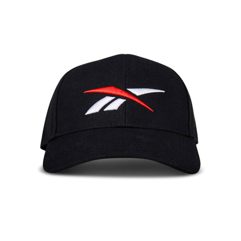 The Reebok Vector Baseball Cap in black features an embroidered red and white Reebok logo on the front, displayed against a white background.